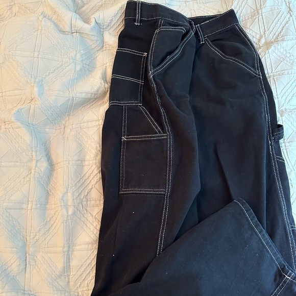 Black Garage Cargo Pants, with white stitching on the side. - Picture 2 of 4